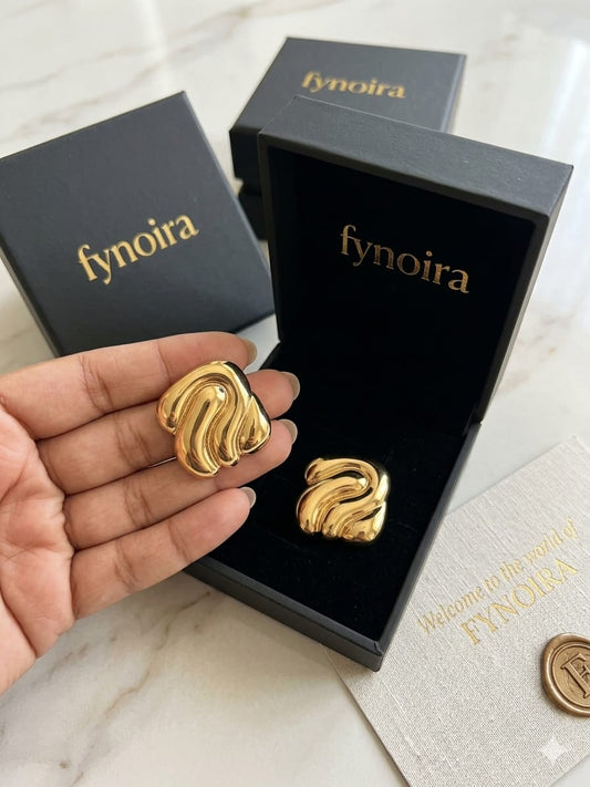 sculptural gold stud earrings